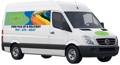 White delivery van with a sign advertising "FREE PICK UP & DELIVERY" and a phone number, featuring colorful shirts and a green logo on the side and hood.